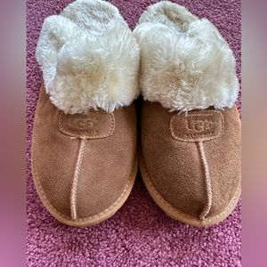 Ugg slip on slippers. Either size 7.5 or 8 ( not sure)